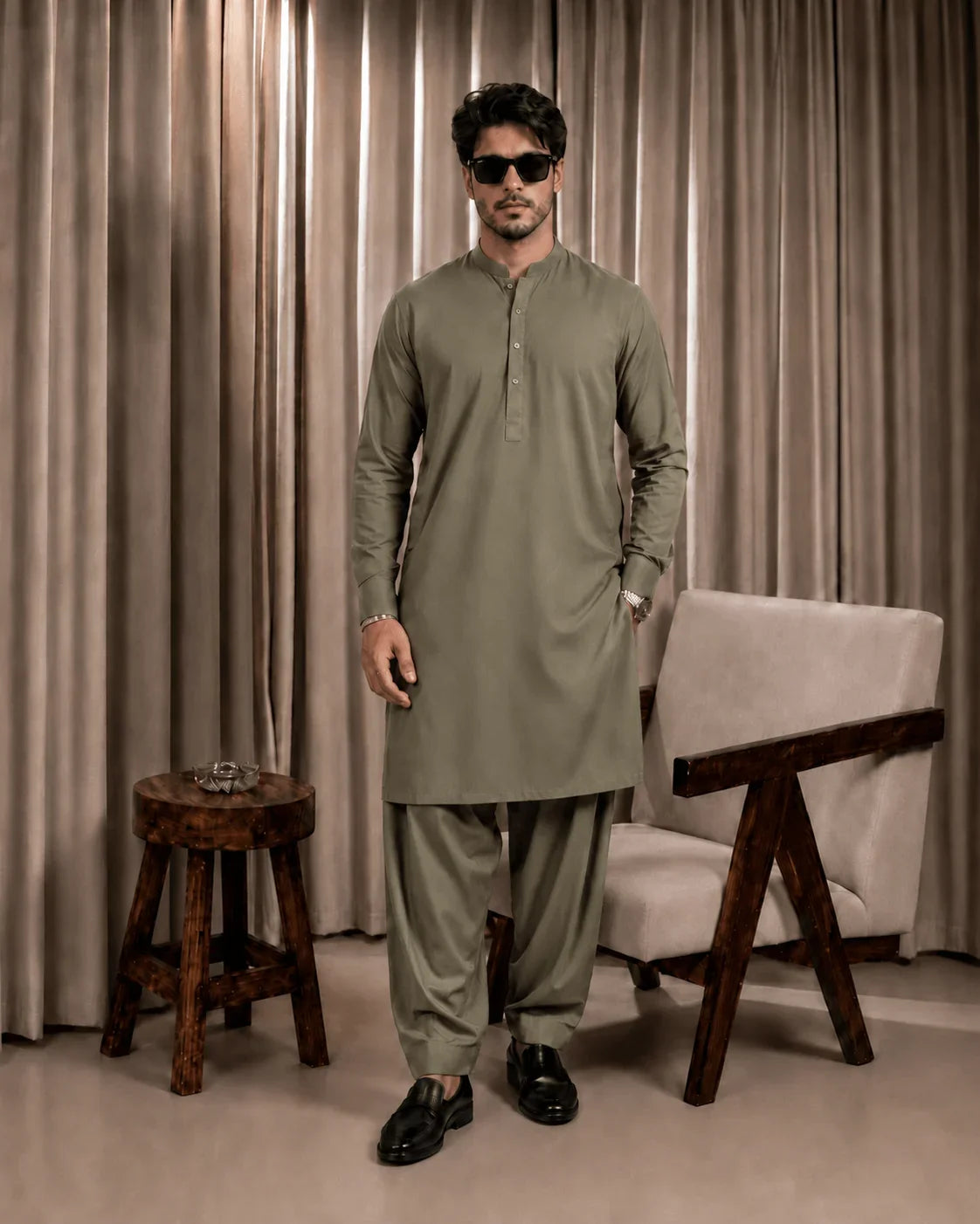 Olive green men's shalwar kameez in premium suiting fabric, ideal for formal and festive occasions
